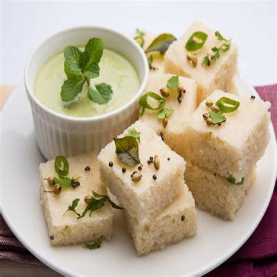  ¡Dhokla: Una explosión de sabores especiados y texturas esponjosas!